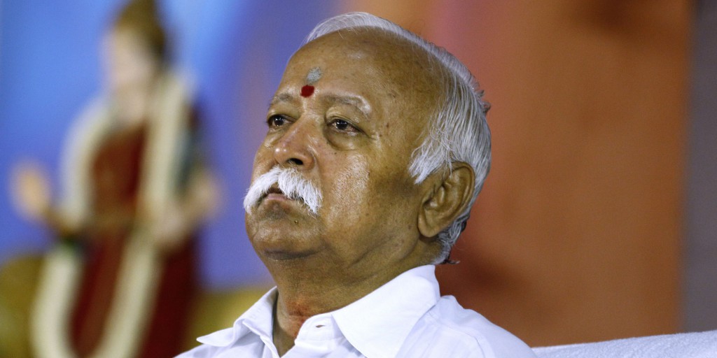 Hindu nationalist Rashtriya Swayamsevak Sangh (RSS), or the National Volunteers Force chief Mohan Bhagwat attends a meeting of their organization in Bangalore, India, Friday, March 7, 2014. The three day annual top level meeting of RSS, the parent organization of India's main political opposition Bharatiya Janta Party (BJP) started Friday. (AP Photo/Aijaz Rahi)